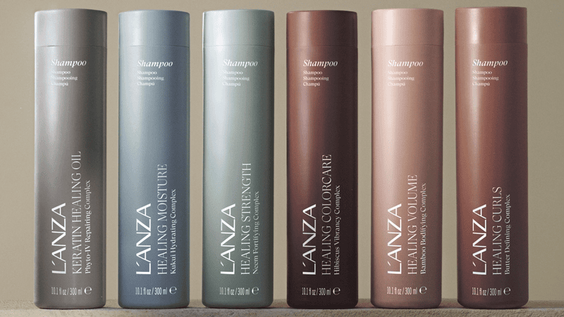 Assortiment L'ANZA Healing shampoo flessen, waaronder Keratin Healing Oil, Healing Moisture en Healing Volume.